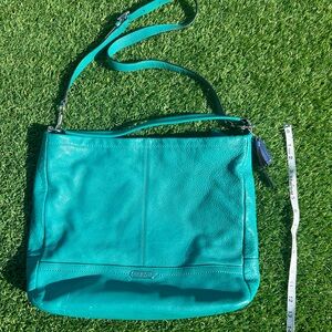 Coach teal cross body or shoulder bag.